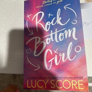 Lucy scores romance book Rock bottom girl.